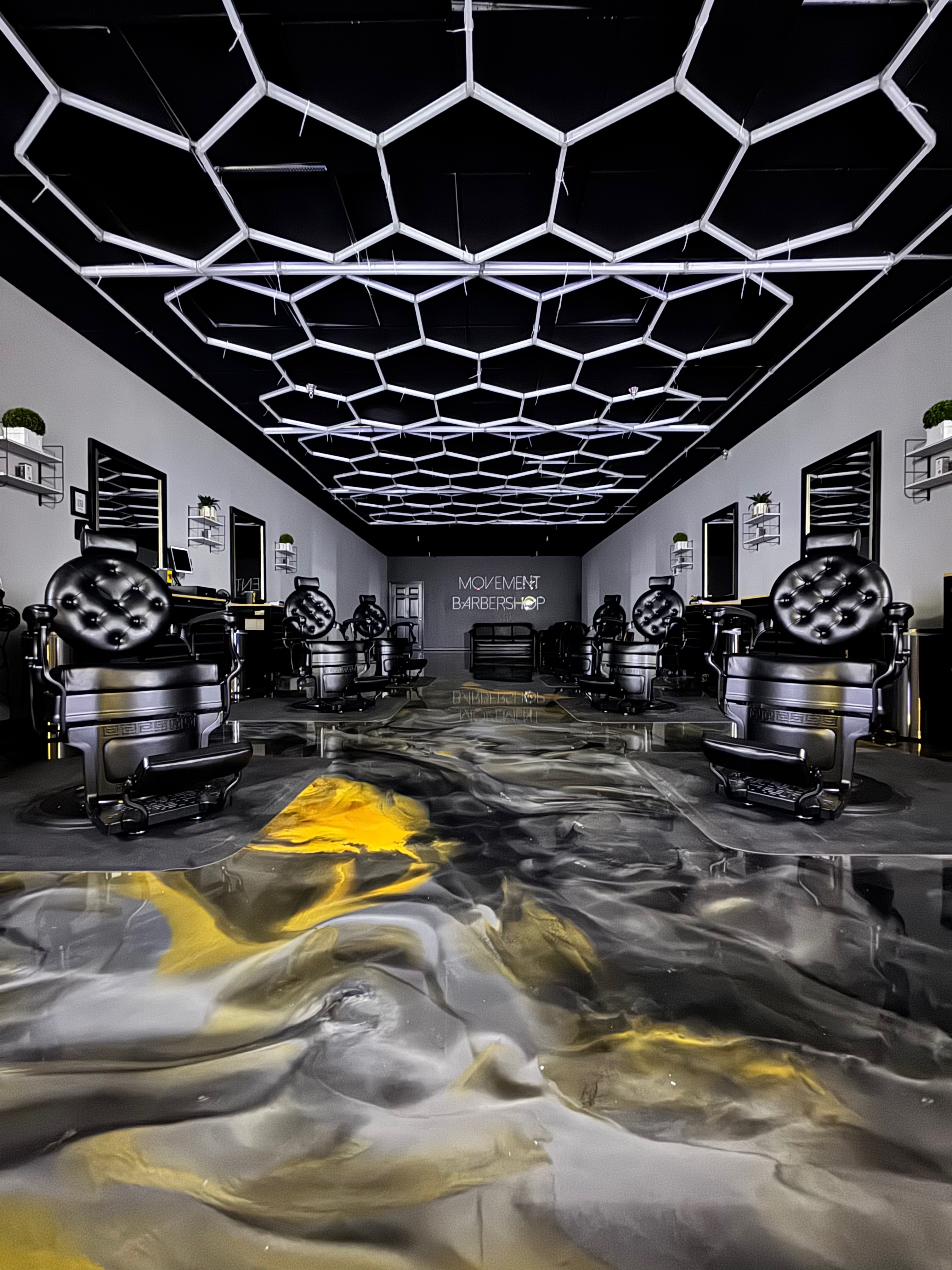 Silver and gold metallic EpoxyMax floor at Movement Barbershop