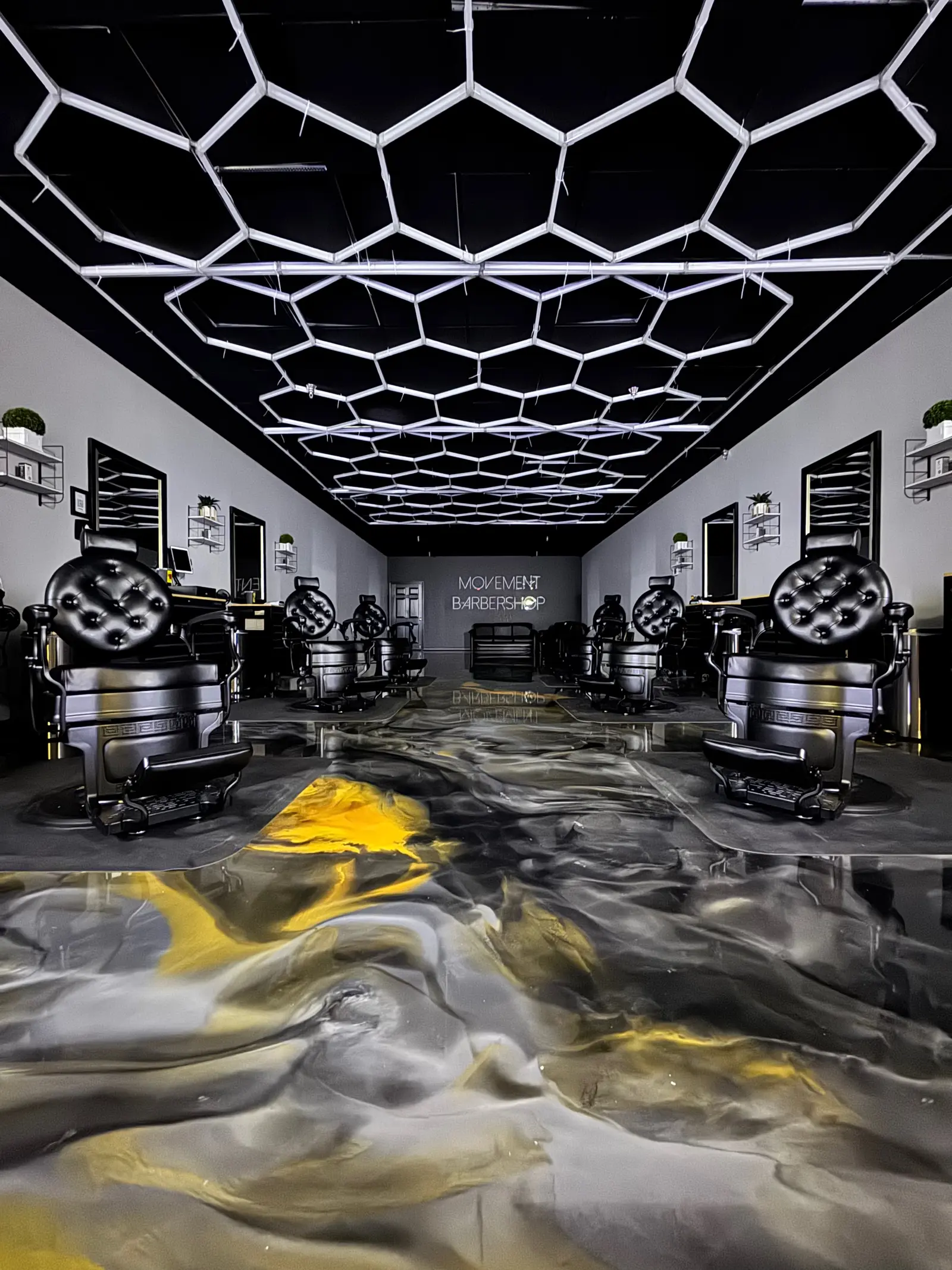 Silver and gold metallic EpoxyMax floor at Movement Barbershop