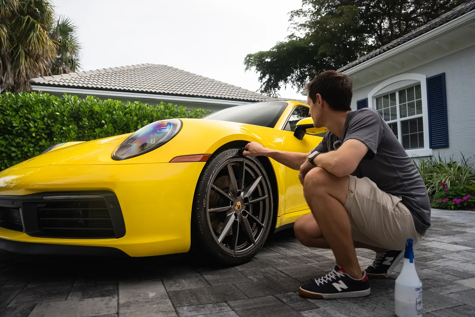 FlyMyRide service van and Porsche at a customer’s home